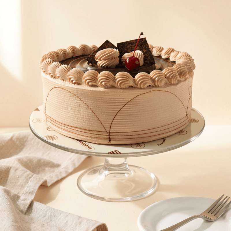 Torta Moka — Queque de chocolate bañado en almíbar de café con crema mocca.